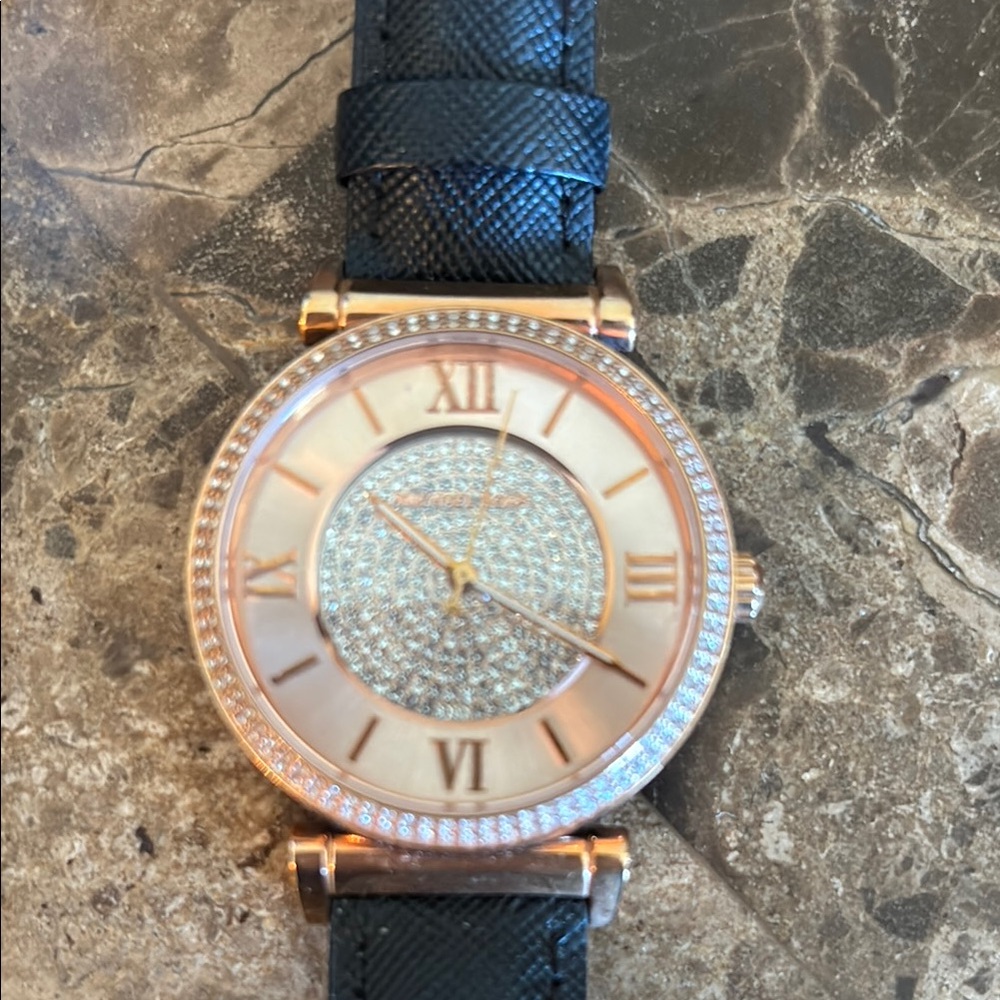 Elegant Black and Gold Women's Watch
